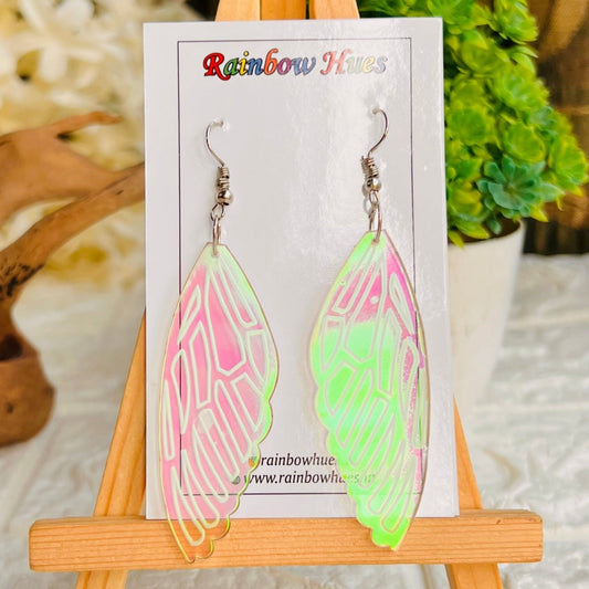 These Fairy Wing Earrings feature elegant holographic designs that sparkle and flutter delicately. The iridescent shades create an enchanting aura, perfect for adding a touch of magic to any look. The lightweight design ensures a comfortable fit and makes these earrings a must-have fashion accessory.