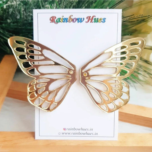 Be the envy of every room with these beautiful Golden Butterfly Wing Earrings! Flashy and glamorous, their shiny golden wings will add a brilliant shine to any outfit. Perfect for special occasions or everyday wear, these earrings will become an eye-catching statement piece.