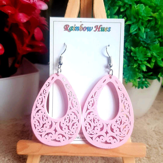 Glimmering pink wood cutouts in the shape of trellises make these earrings the perfect statement piece. Crafted with lightweight materials, these earrings are comfortable and won't weigh you down. Add a hint of edge and elevate your wardrobe with these trendy and stylish earrings!