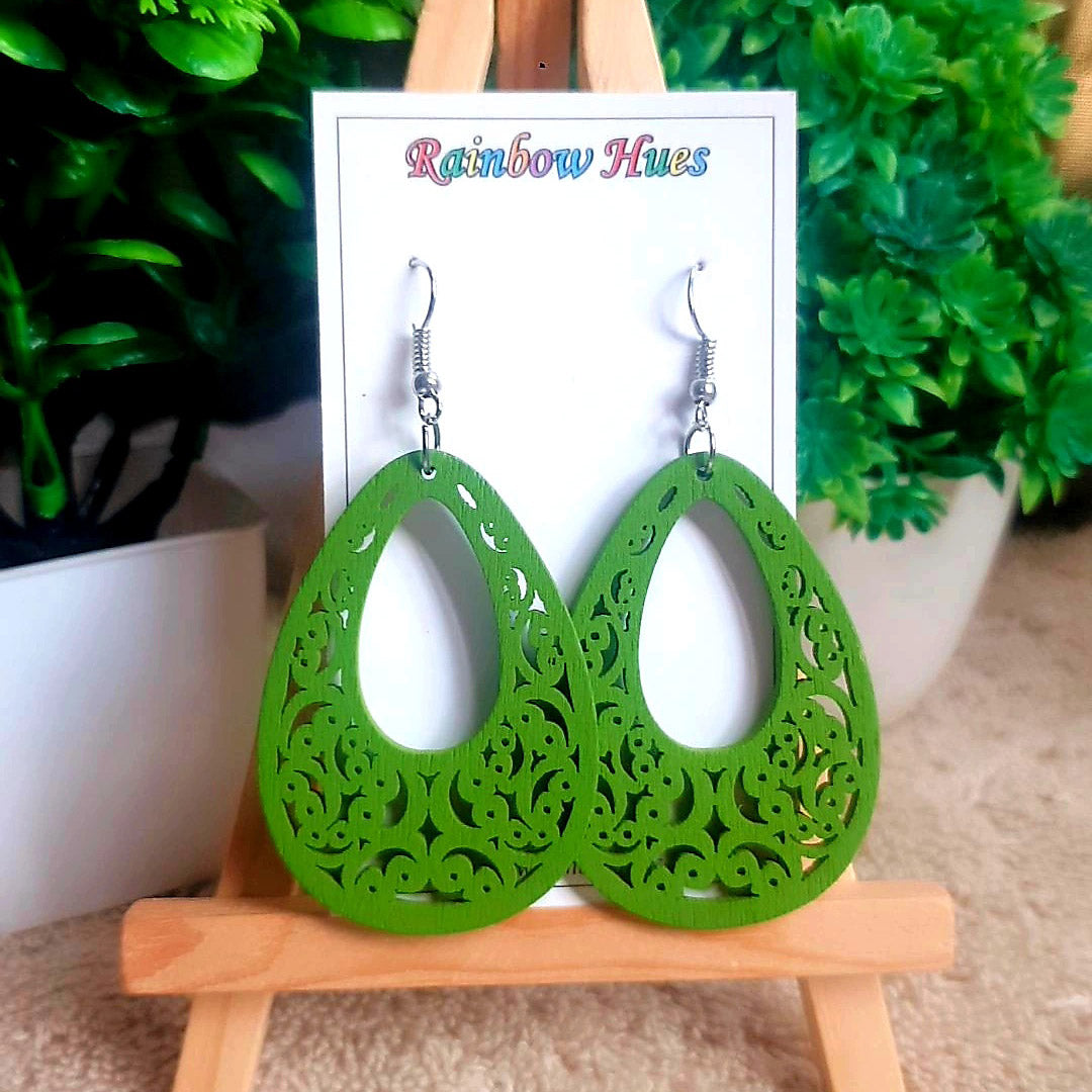 Super lightweight green wooden cutout earrings These earrings are perfect for everyday wear, offering a simple and subtle style without sacrificing any of the comfort and quality of a statement piece.