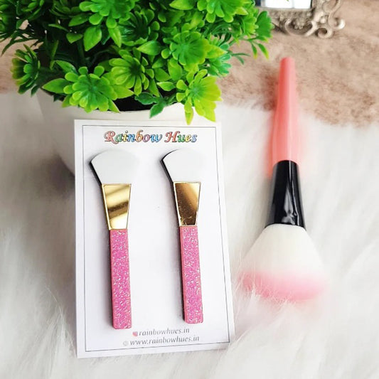 Adorn your ears with these glamorous Blush Brush earrings. They feature pretty white, glitter pink and glossy mirror gold brush designs, dazzling enough to make you shine brighter than any star! Make a glam statement with these eye-catching earrings.