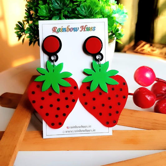 Introducing Strawberry Earrings! Delightful and charming, these earrings are sure to make you stand out in a crowd. Crafted with love and care, these strawberry earrings feature realistic details that bring a cheerful flair to your look. Why not show off your unique style with these fun and flirty earrings?