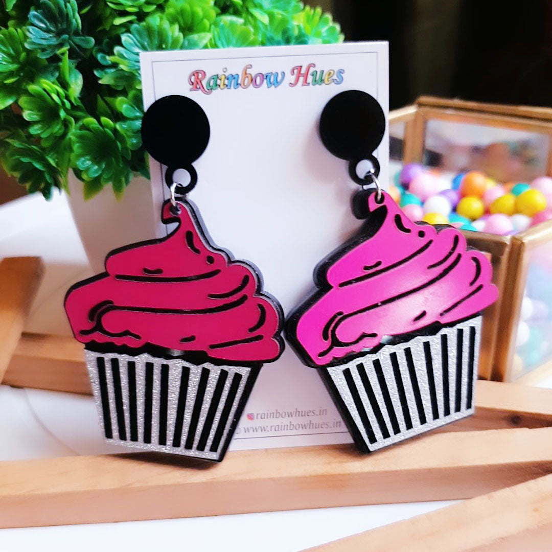 Add a joyful touch to your everyday style with these charming Strawberry Cupcake Danglers. Perfectly crafted from vibrant pink, they’ll bring warmth to every look. Make heads turn and feel amazing in these beautiful earrings!