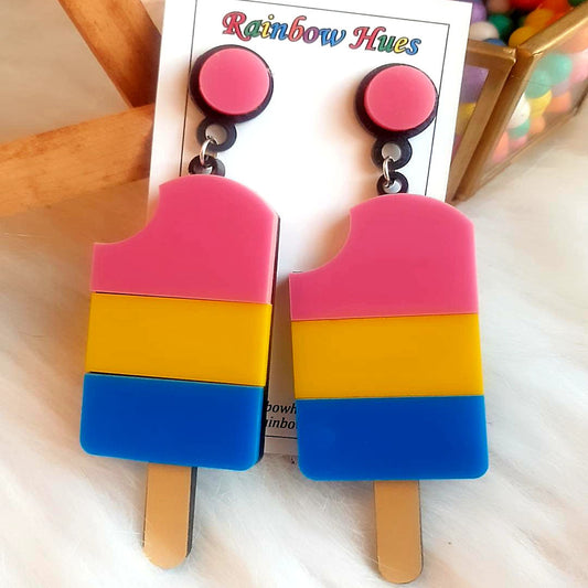Look sweet and stylish with a pair of Tri-Ice-Cream Earrings! These delicious-looking earrings feature a triple scoop of ice cream in multiple colors. Make your summer style complete and add a hint of sweetness to every look with these fun and flirty earrings.
