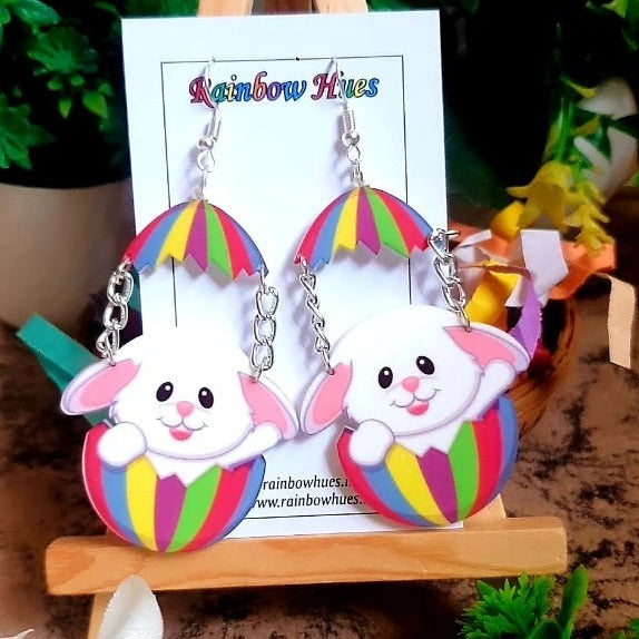 These Rainbow Bunny Earrings will be the perfect addition to your spring wardrobe! Show off your love for bunnies with a vibrant, colorful twist. The light-weight design will keep you comfortable all day long, while the metal based construction ensures they'll keep up with your adventures. Express yourself with these cute Rainbow Bunny Earrings!