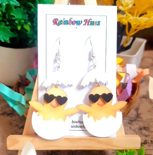 Make an impression and show off your independent spirit with the Baby Boss Chick Earrings. These stylish earrings feature a charming baby chick in a boss sunglasses, and are sure to turn heads — making them the perfect accessory to stand out and make a statement!