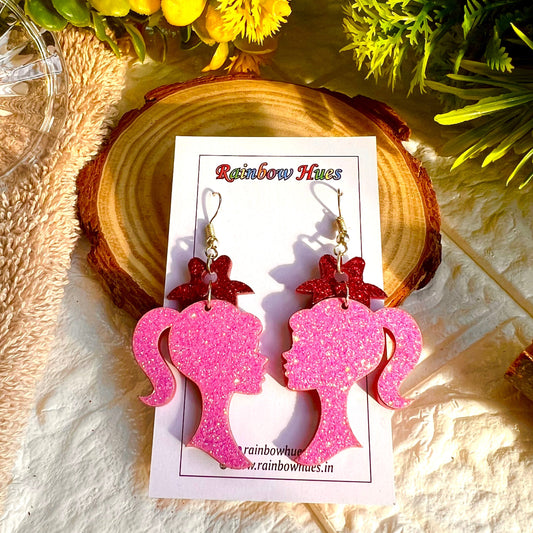 These Barbie Face Earrings are the perfect way to add a trendy, fun touch to any ensemble. Crafted with intricate detail, they feature Barbie's iconic face that stands out wherever you go. Dress them up or down, these earrings are sure to turn heads.