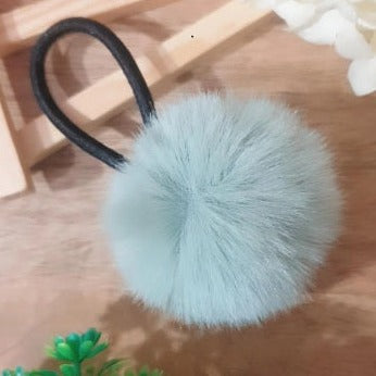 Add a touch of playfulness to your look with our Pom Pom Hair-Tie. Crafted from high-quality materials, this super soft and fluffy hair-tie ensures a comfortable and secure fit. These hair-ties will add a hint of fun to any hairstyle.