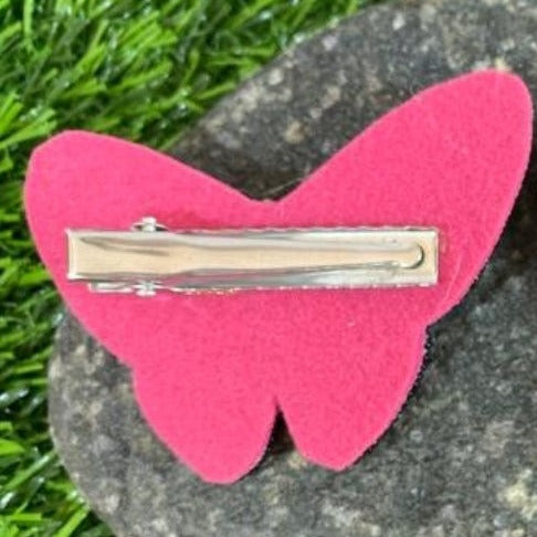 Add a touch of extra glamour to any hairstyle with our handmade sequin butterfly hairclip. Crafted with beautiful pink sequins, it catches the light beautifully for a glamorous touch. Versatile and lightweight, it's perfect for any occasion.