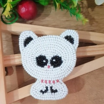 This Handmade White Beaded Kitty Hairclip is the perfect finishing touch for any look. Handcrafted from white beads, this lightweight, one-piece hairclip showcases a cute kitty face and is sure to add charm to any hairstyle.