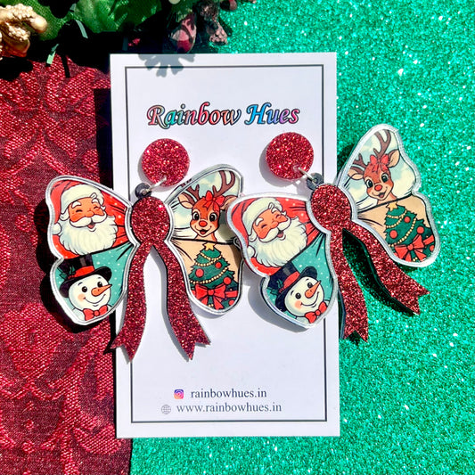 Christmas-themed butterfly earrings with Santa Claus, reindeer, and snowman designs