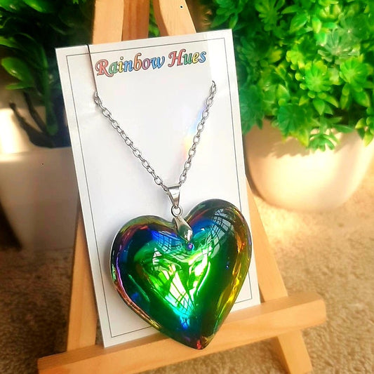 Make a statement with this Jazzy Glass Heart Necklace! Its bold design catches the eye with sparkling jazzy hues, creating a perfect aura. Perfect for any occasion, this elegant necklace is sure to turn heads!