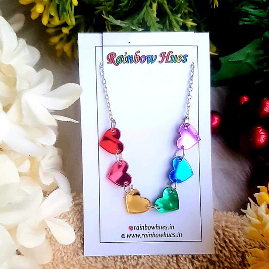Make a statement with the Rainbow Heart Necklace! Perfect for expressing your stylish Pride personality, this one-of-a-kind necklace features a vibrant, rainbow-colored heart that will add a splash of color to any ensemble. Stylish, unique, and sure to be noticed - wear this necklace and be unforgettable!