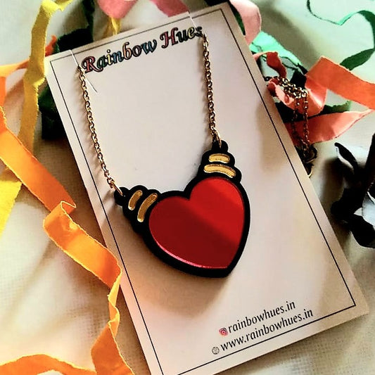 Show someone special you care with this gorgeous Emoji Heart Necklace. Crafted with a glossy, mirror red and gold heart, it sparkles in the light and is sure to make a lasting impression. Perfect as a gift for that special someone, tell them you love them in style with this beautiful love emoji necklace. Show your love today!