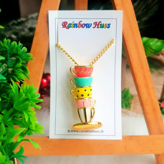 This Rainbow Teacup Necklace is a must-have accessory! Its five colourful teacups provide unique, classy style and a beautiful splash of colour. Transform any outfit to a fun, eye-catching ensemble with this beautiful piece of jewellery!
