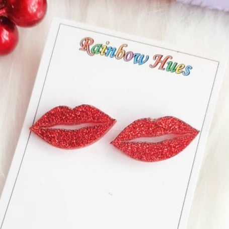 Take your look to the next level with Glitter Lips Studs! These glamorous earrings will make you sparkle in any outfit. Red shimmery lips studs which are super cute and unique pair of studs to add to your earring collection, they're a perfect accessory to make a statement and dazzle your peers. Sparkle on!