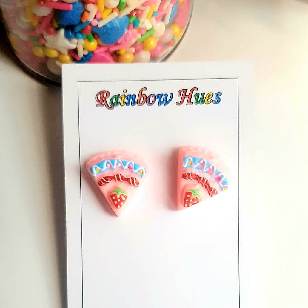 These Strawberry Pastry Stud Earrings are the perfect way to make a statement with style! Deliciously crafted with both vision and detail, these earrings are sure to inspire thoughts of sweet treats and bring a smile to your face. Show off your unique flair with this one-of-a-kind jewelry piece!