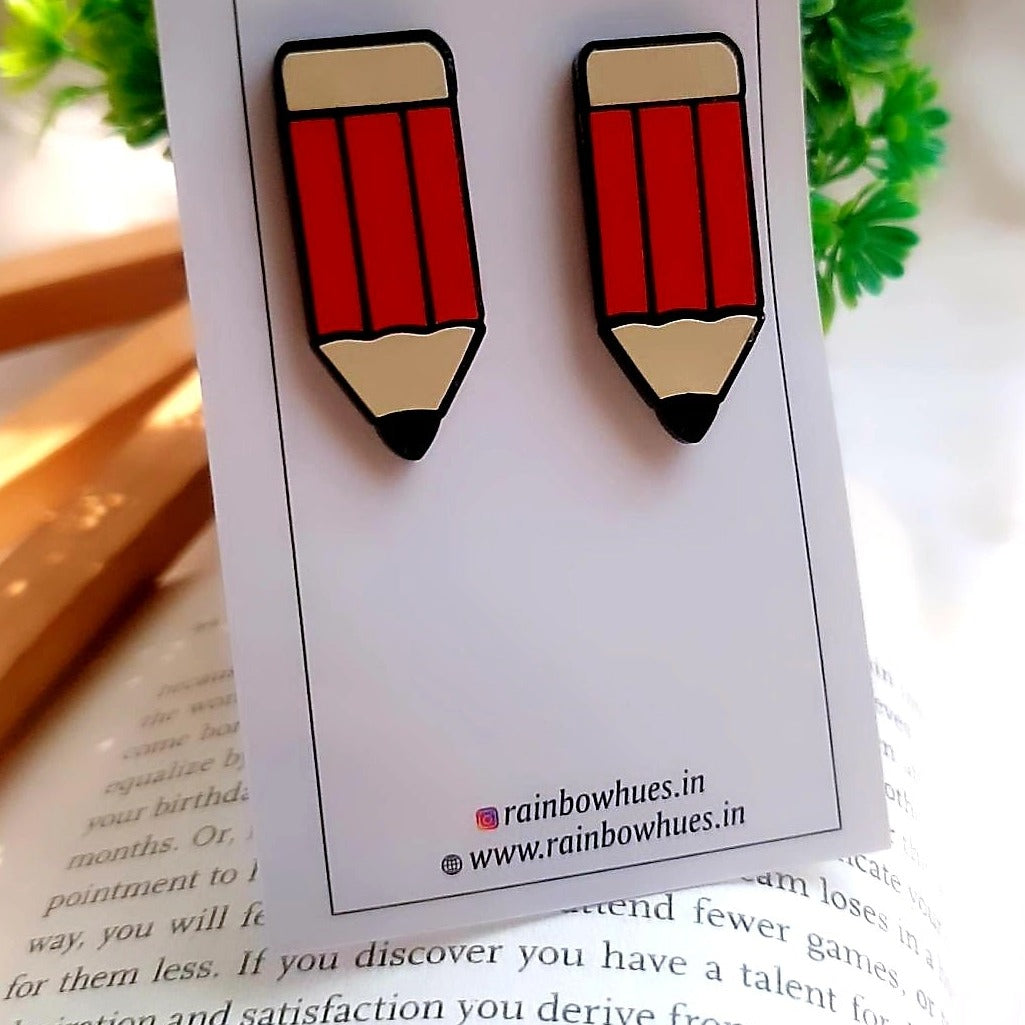 Delightful and fun, these Pencil Stud Earrings are perfect for accenting any outfit. Crafted with care, these cute lil studs will bring a smile to your face and spread joy everywhere you go. Make a stylish and unique statement with these playful earrings.