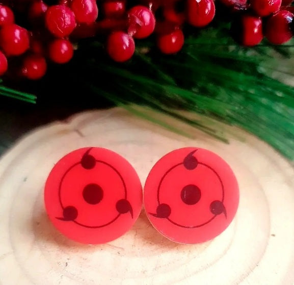 Be inspired by the anime classic Naruto - put on a pair of Sharingan earrings and show your love for the series! High-quality and stylish, these stud earrings are a must-have for any anime fan!