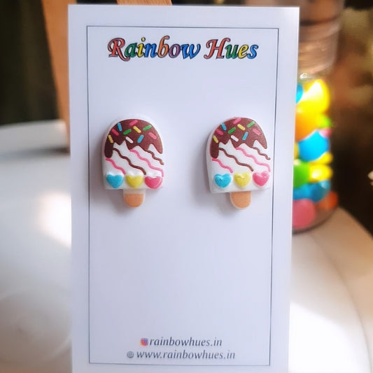 Treat your ears to something sweet! Our Vanilla Popsicle Stud Earrings will be the perfect accessory to any outfit. Eye-catching and fun, these earrings feature a yummy popsicle design. Grab a pair and add a delicious touch of style to your look!