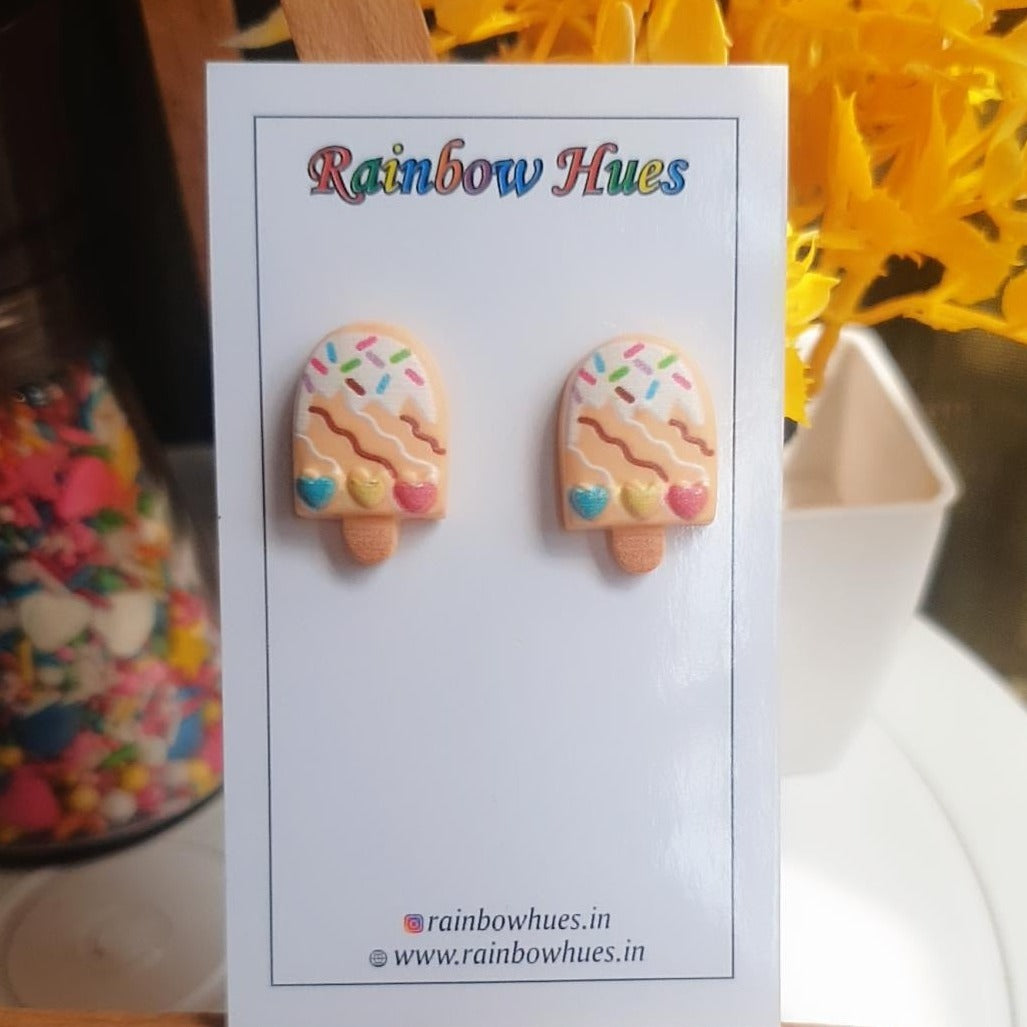 Delight your ears with these delectable Mango Popsicle Stud Earrings! Inspired by the sweet, tropical flavor of mango popsicles, these charming earrings make for a fun and unique accessory. Enjoy the juicy flavor of mango all day long - let them tantalize your taste buds and make you smile.