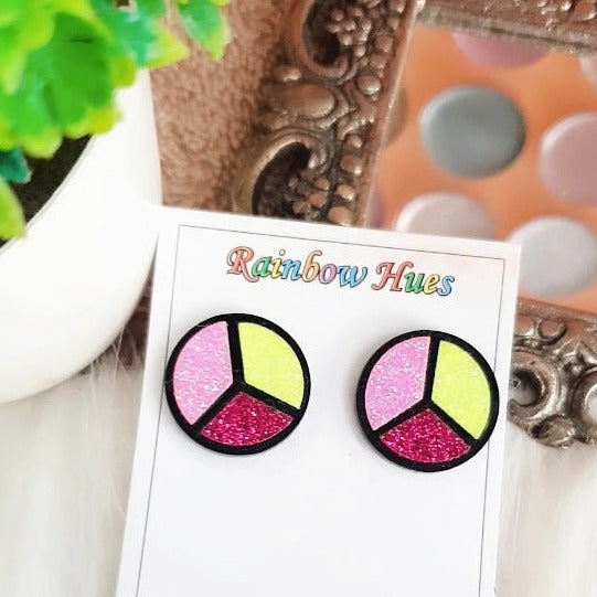 Add a touch of sparkle to your look with our Glitter Eyeshadow Palette Stud Earrings! Featuring shimmery baby pink, dark pink and flourocent shades in a palette design, these earrings are perfect for creating show-stopping style. Make a statement wherever you go with these beautiful, eye-catching earrings!