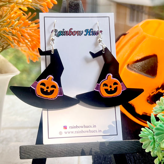Halloween-themed earrings with witch hats and pumpkin face.